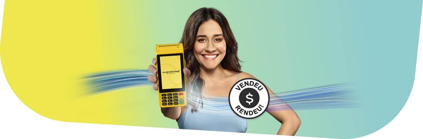 Woman holding a yellow payment terminal.