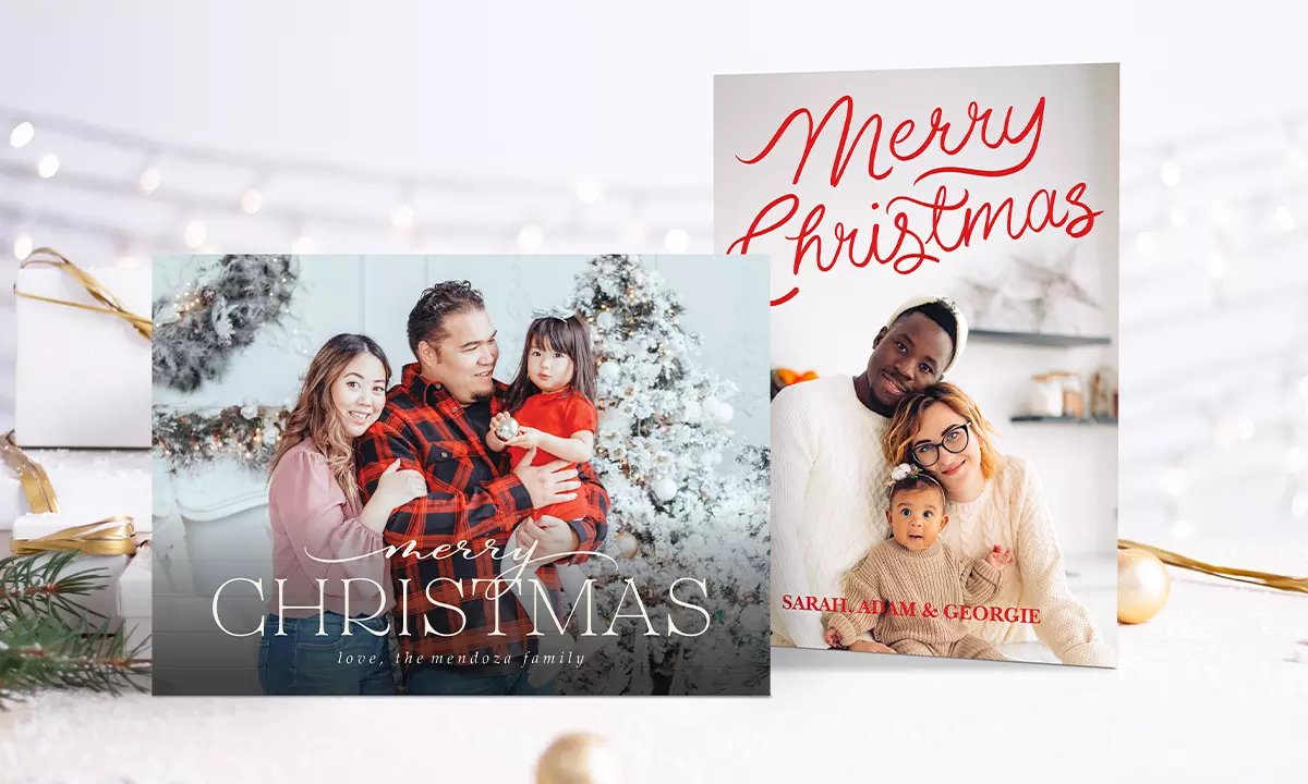 Two Christmas cards with family photos.