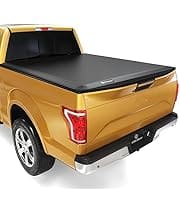 Here's an alt tag for the image: `Gold truck with black tonneau cover`