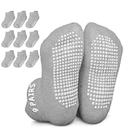 Here's an alt tag for the image: Nine pairs of gray grippy socks.